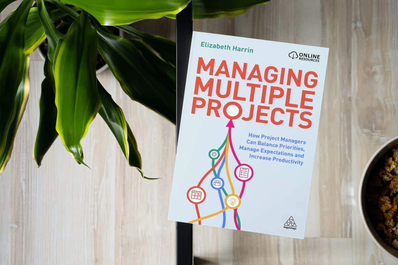 Managing Multiple Projects book on a table